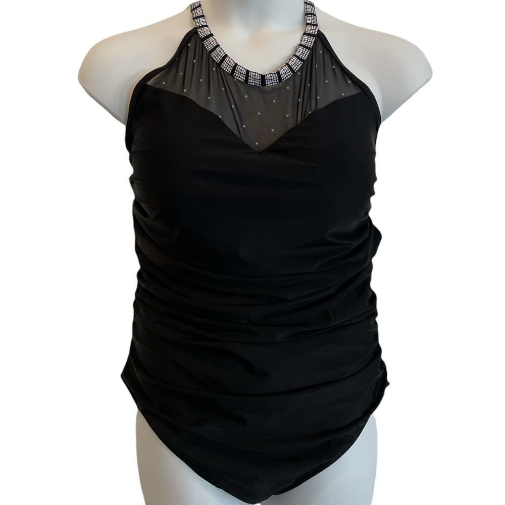 Black one-piece Swimsuit with mesh trim. New with tags size 24W